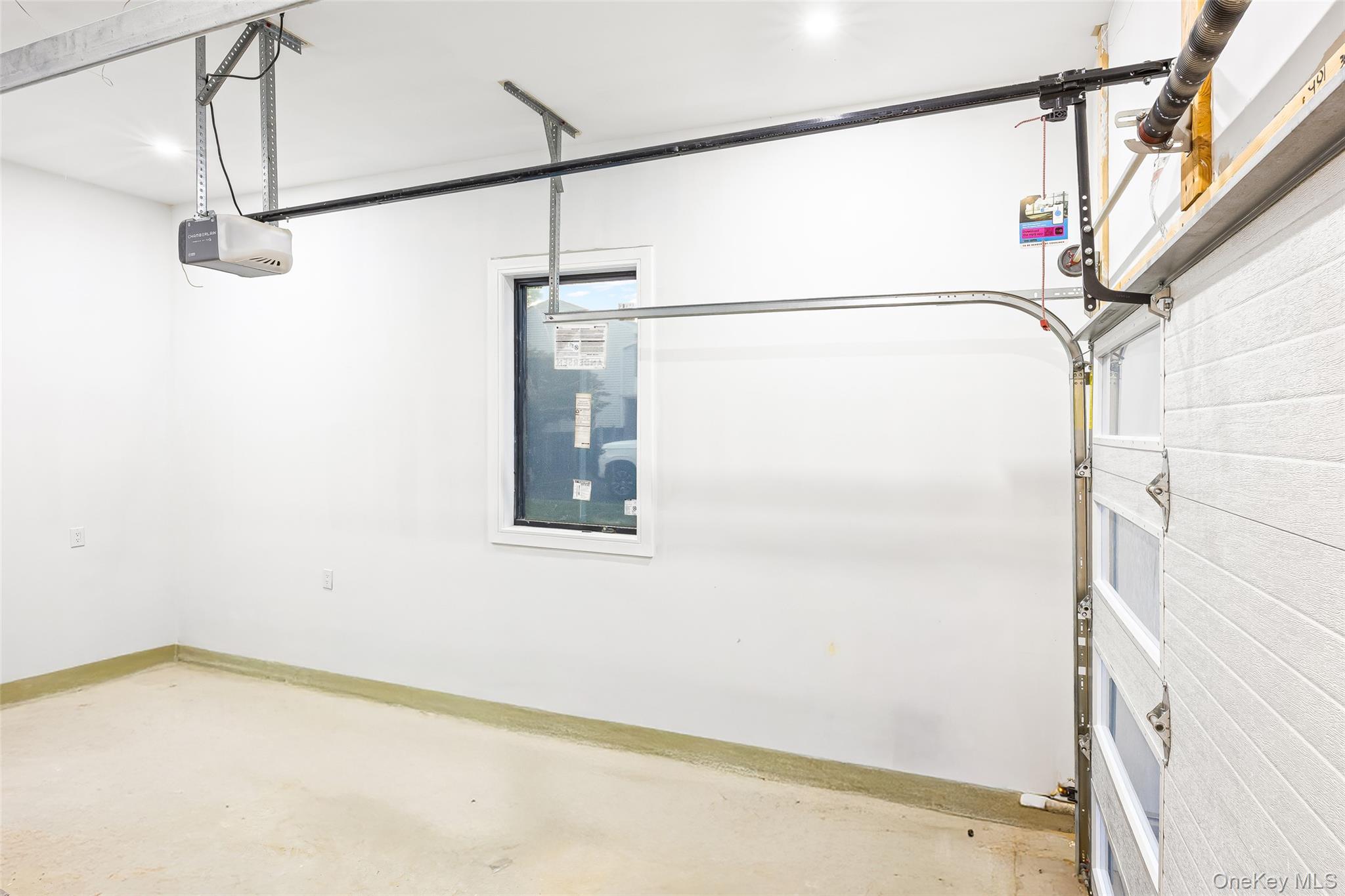 26 Tremont Avenue Patchogue, NY 11772 - Photo 45 of 50 a bathroom with a shower and a shower head