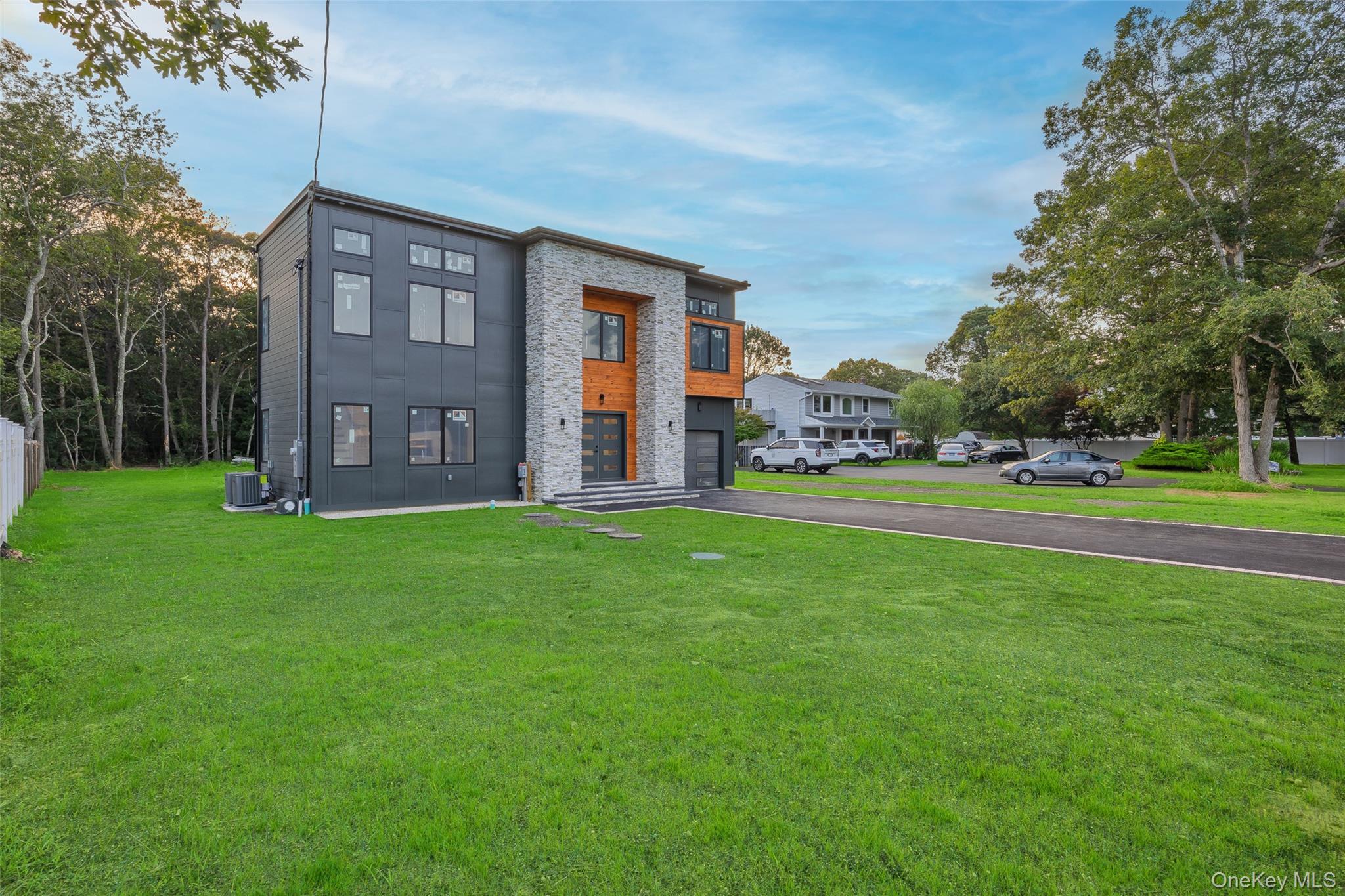 26 Tremont Avenue Patchogue, NY 11772 - Photo 10 of 50 a view of a house with a yard
