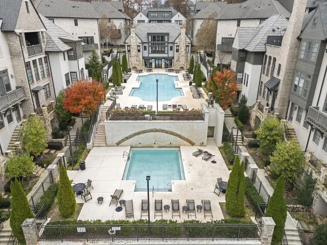 a front view of a building with outdoor space