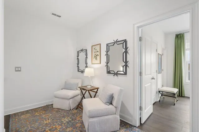 a bed room with a bed window and a couch