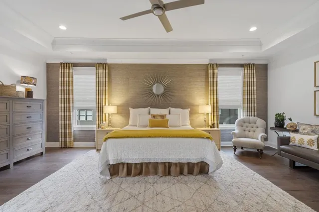 a bedroom with a bed and a couch