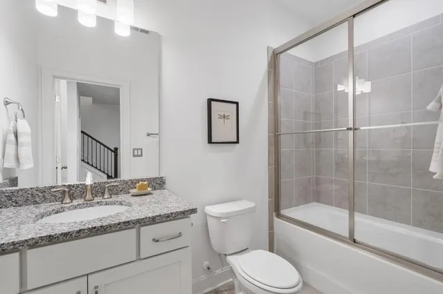 a dining room with furniture and windows