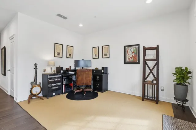 a front view of a building with a street