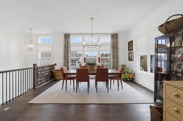 a large kitchen with stainless steel appliances granite countertop a stove and a refrigerator