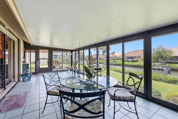 a view of a room with furniture and wooden floor