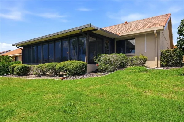 a view of a house with garden