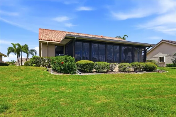 a view of front of house with a yard