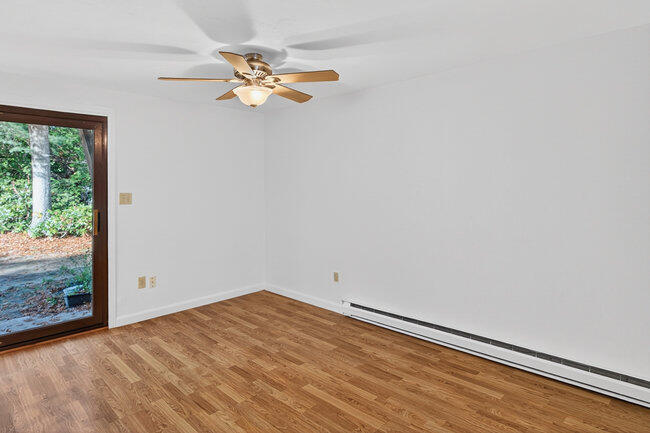 195 Falmouth Road, Unit 10E Mashpee, MA 02649 - Photo 20 of 33 an empty room with a window