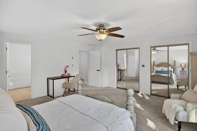 195 Falmouth Road, Unit 10E Mashpee, MA 02649 - Photo 28 of 33 a bedroom with a bed and furniture