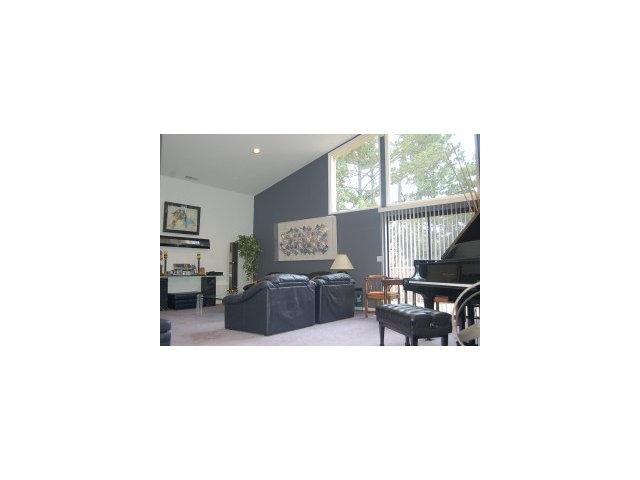 4020 Costado Road Pebble Beach, CA 93953 - Photo 3 of 9 a living room with furniture and a large window