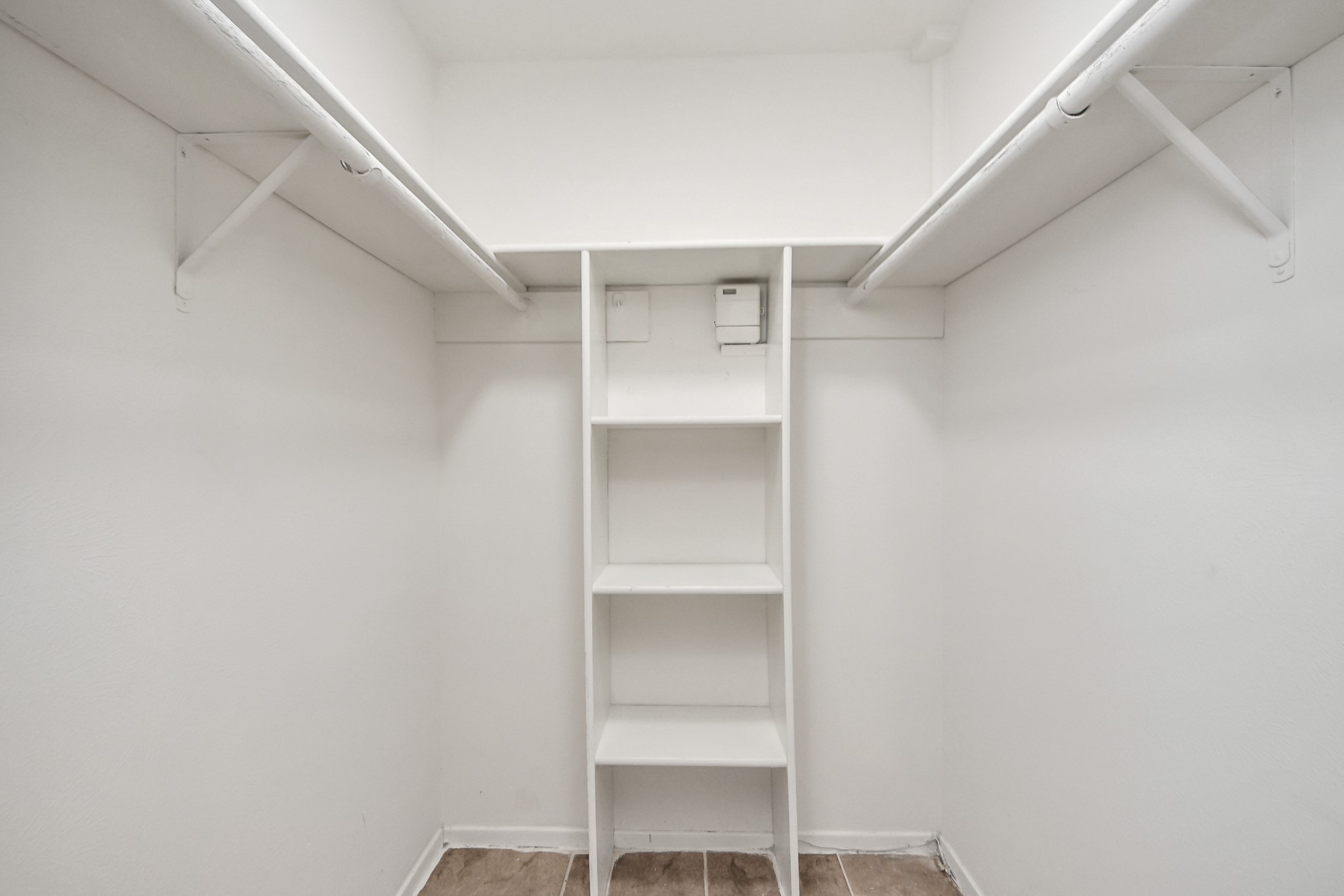 7303 Foxwick Lane Humble, TX 77338 - Photo 21 of 38 a view of an empty walk in closet