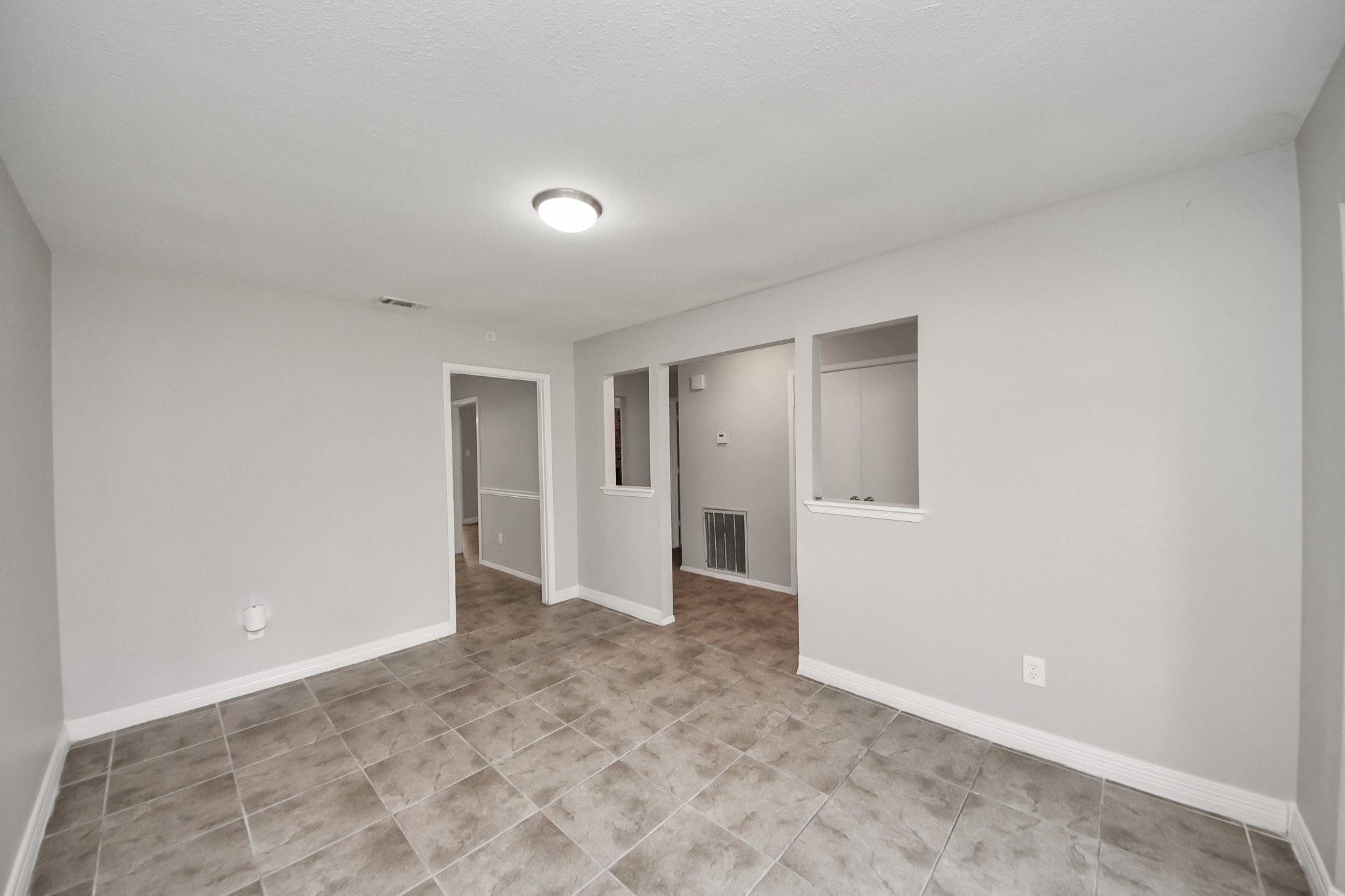 7303 Foxwick Lane Humble, TX 77338 - Photo 35 of 38 wooden floor in an empty room