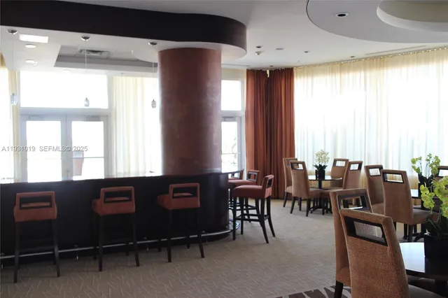 a view of a swimming pool with patio