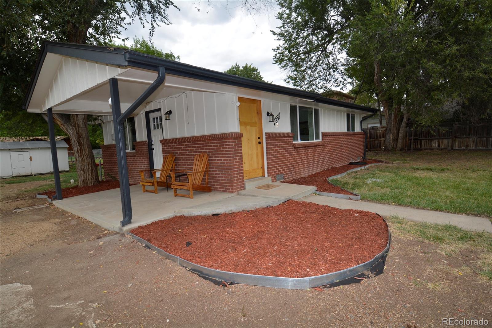 4975 Howell Street Golden, CO 80403 - Photo 2 of 23 a view of a house with backyard