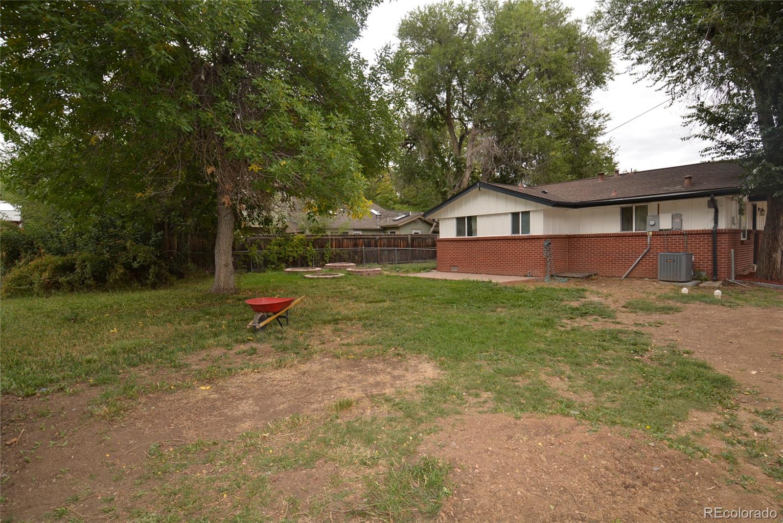 4975 Howell Street Golden, CO 80403 - Photo 7 of 23 a view of backyard of house with green space