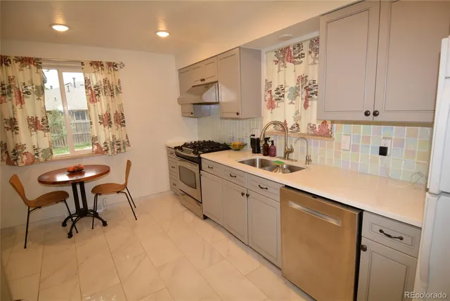 a kitchen with a sink cabinets and counter space
