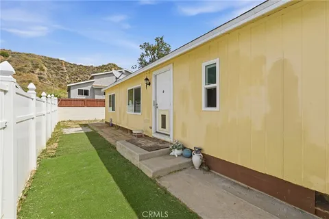 a front view of a house with yard