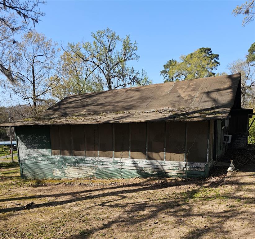 198 Beckham's Camp Road Ringgold, LA 71068 - Photo 1 of 1 View of outdoor structure featuring a sunroom