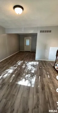 a view of a livingroom with a staircase