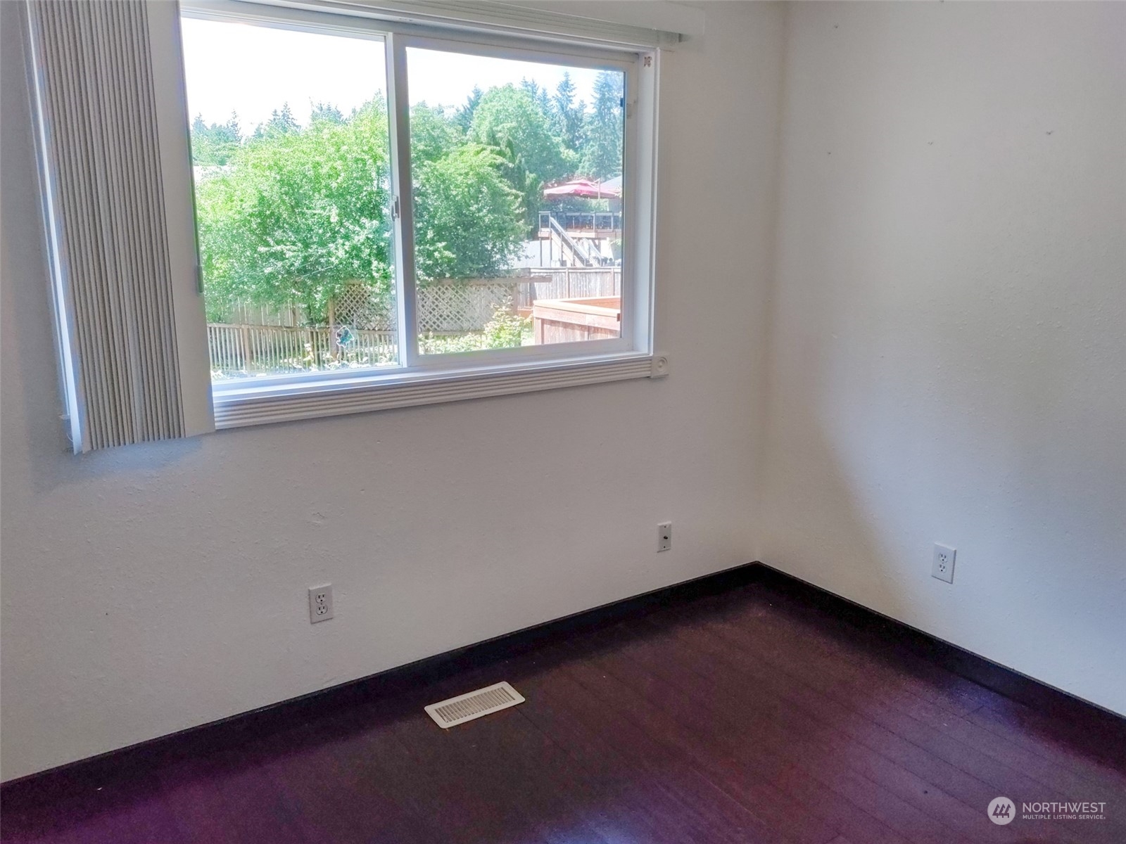 16032 Spanaway Loop Road South Spanaway, WA 98387 - Photo 13 of 28 an empty room with a window