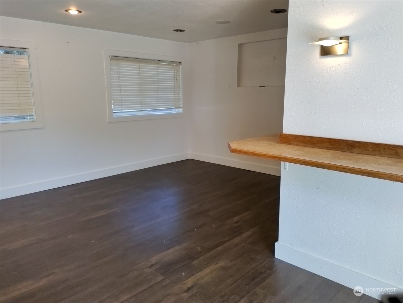 16032 Spanaway Loop Road South Spanaway, WA 98387 - Photo 15 of 28 an empty room with wooden floor and windows