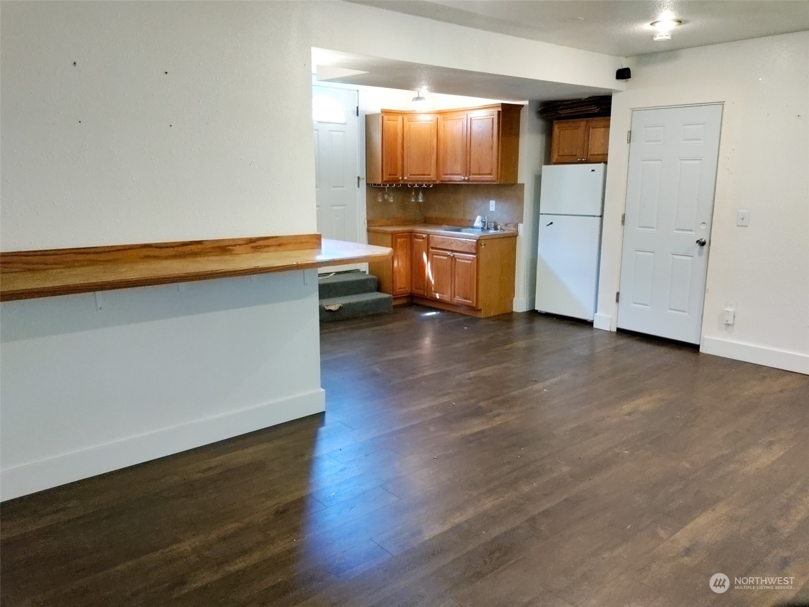 16032 Spanaway Loop Road South Spanaway, WA 98387 - Photo 16 of 28 a kitchen with stainless steel appliances a stove and a refrigerator
