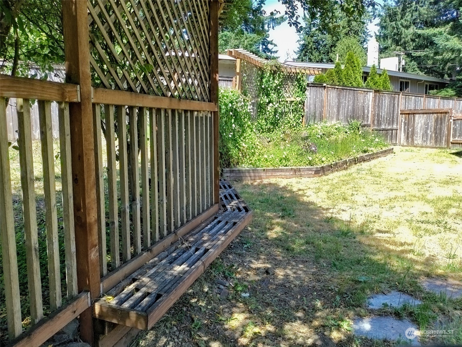 16032 Spanaway Loop Road South Spanaway, WA 98387 - Photo 18 of 28 a view of a backyard with pathway