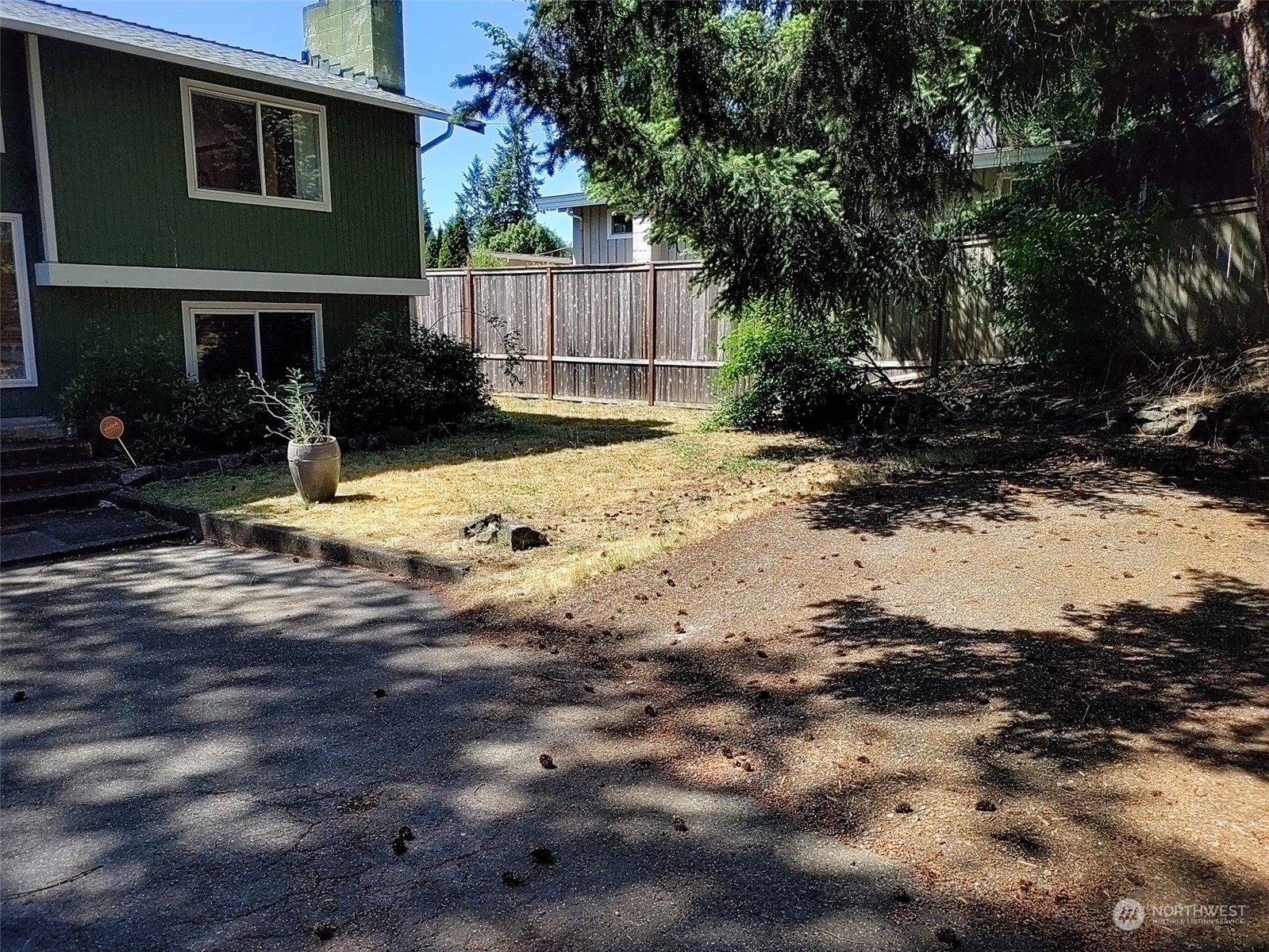 16032 Spanaway Loop Road South Spanaway, WA 98387 - Photo 21 of 28 a view of backyard of house with green space