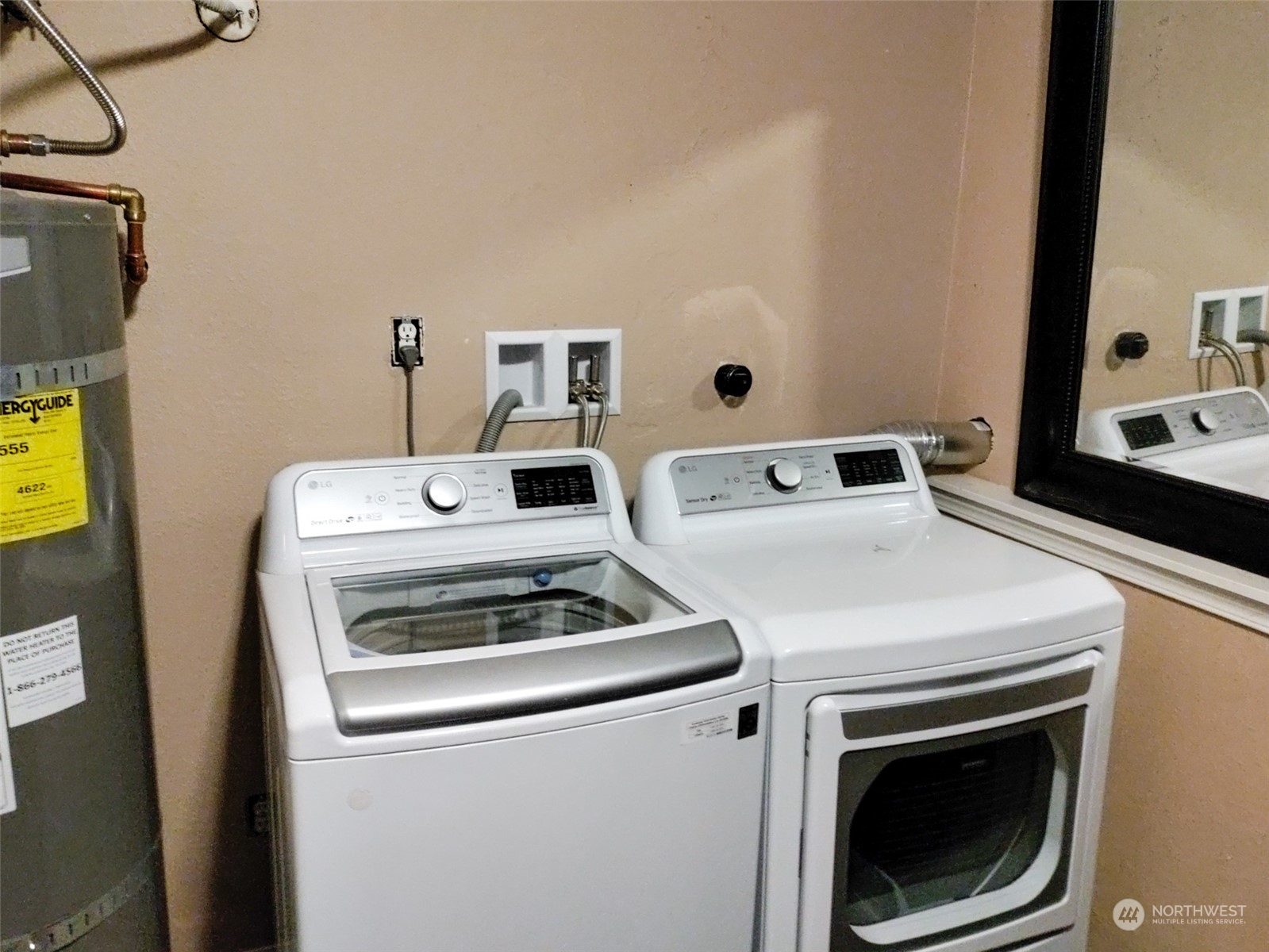 16032 Spanaway Loop Road South Spanaway, WA 98387 - Photo 25 of 28 a utility room with dryer and washer