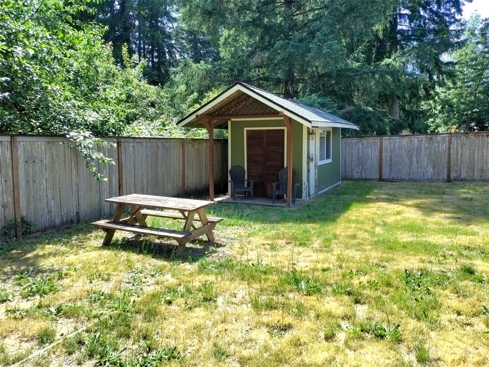 16032 Spanaway Loop Road South Spanaway, WA 98387 - Photo 26 of 28 a fire hydrant in the middle of a yard