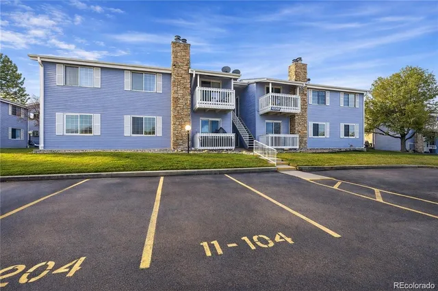 a view of a building with a swimming pool