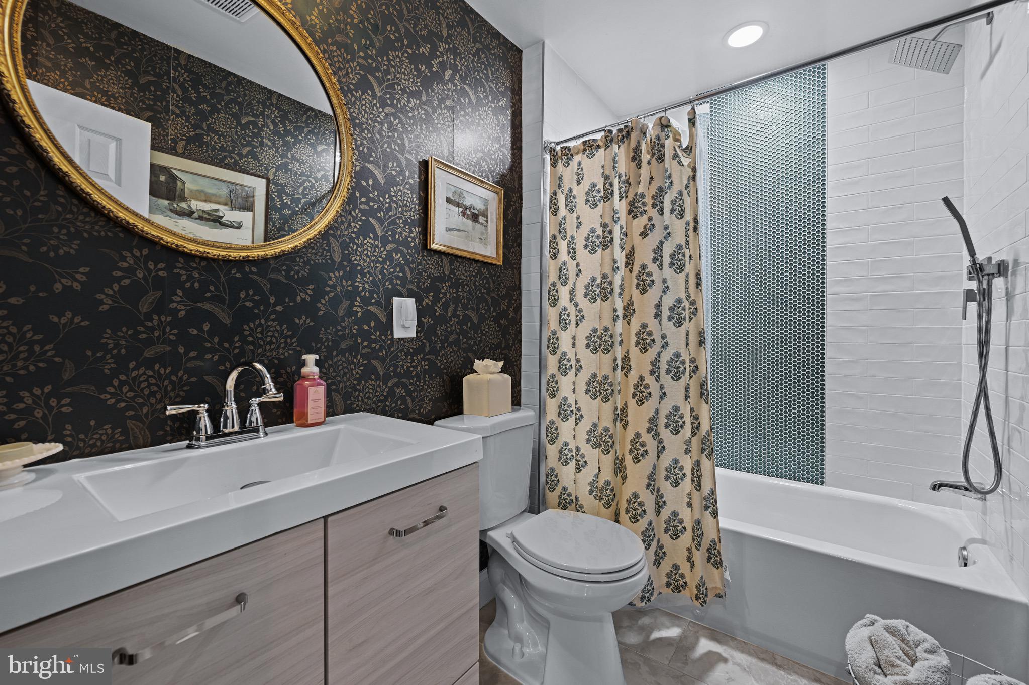 233 Kenwood Road Pasadena, MD 21122 - Photo 22 of 45 First floor bathroom