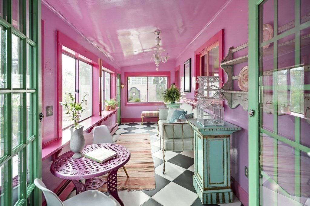 42 Spring Street Somerville, MA 02143 - Photo 13 of 23 a dining area with furniture and a potted plant