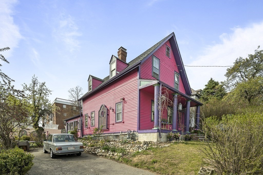 42 Spring Street Somerville, MA 02143 - Photo 23 of 23 a front view of a house with yard