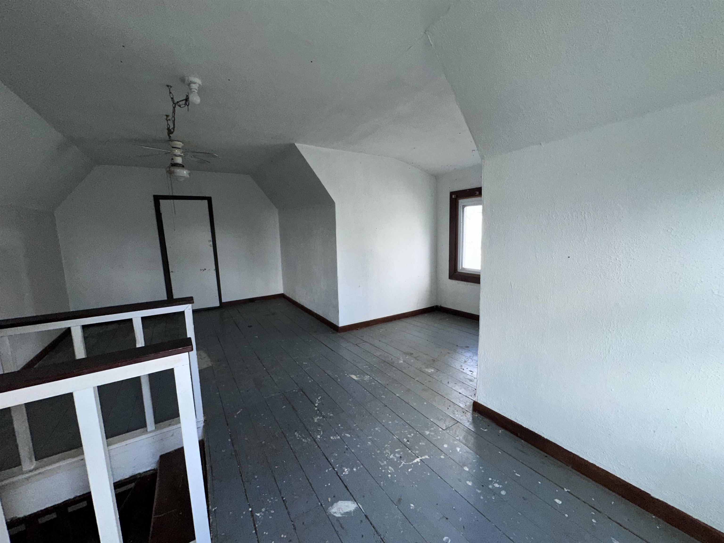 2855 West Florence Road Freeport, IL 61032 - Photo 9 of 13 a view of wooden floor and a chandelier in a room