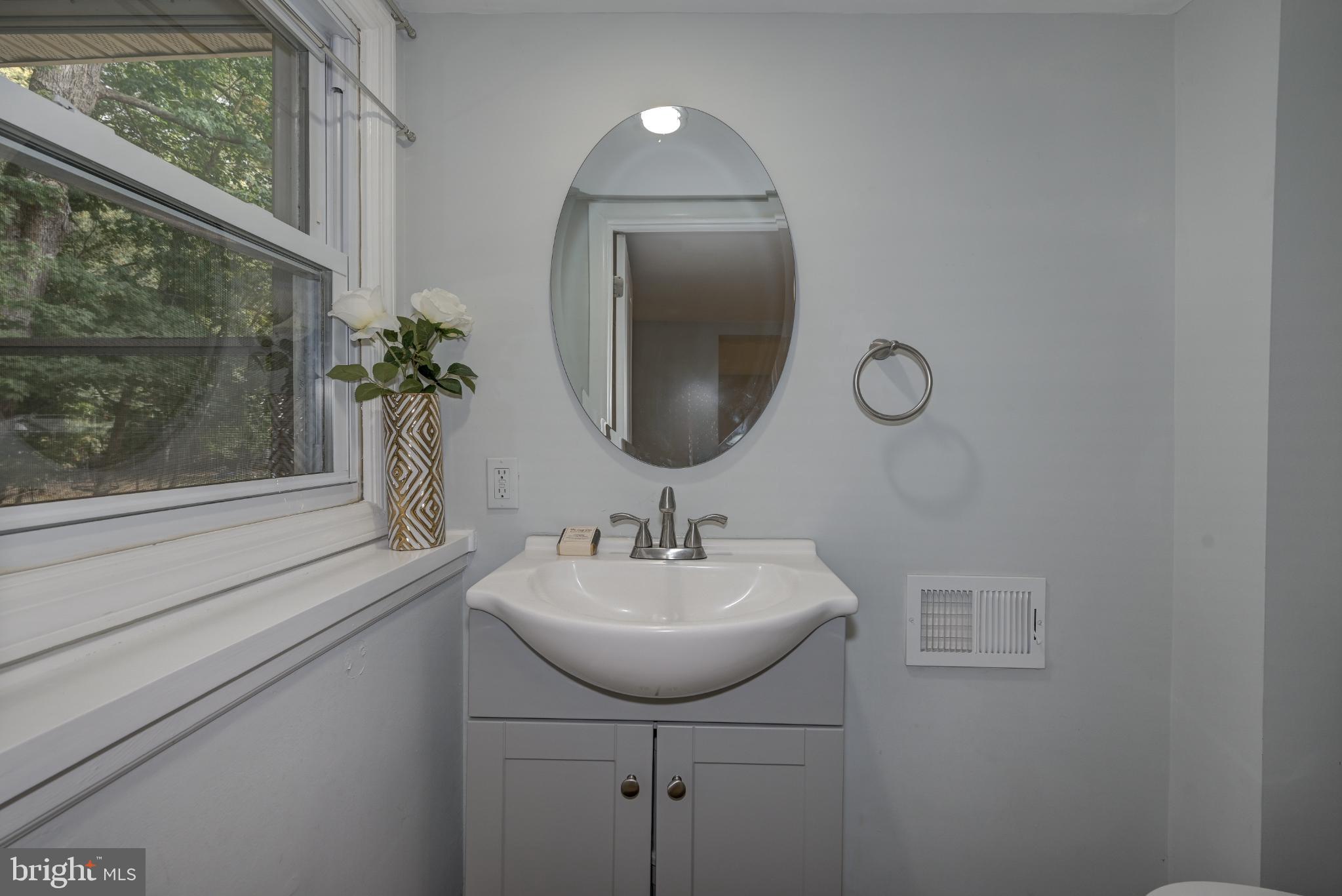 123 Clover Street Mount Holly, NJ 08060 - Photo 26 of 38 Bright and airy bathroom with modern elegance.
