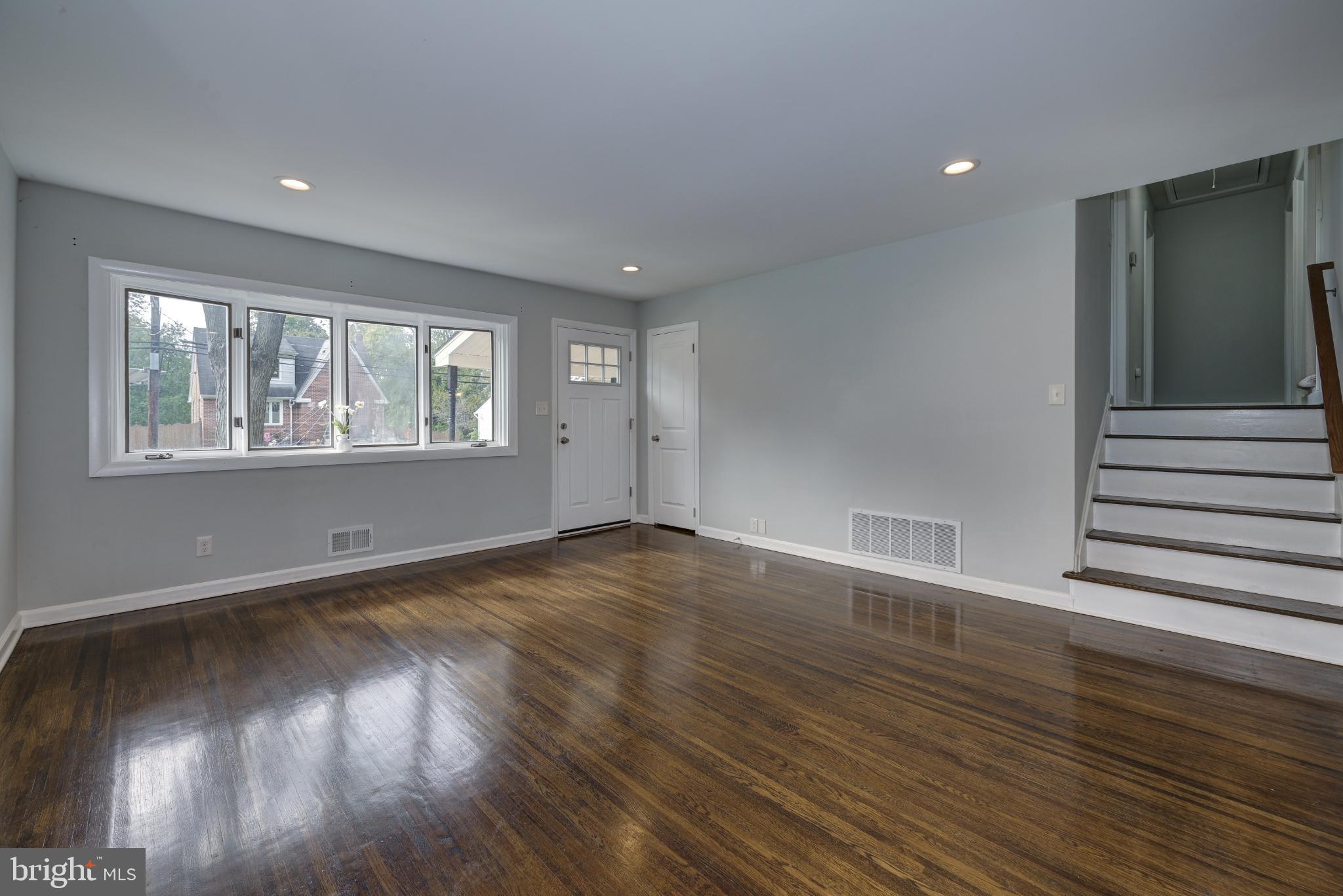 123 Clover Street Mount Holly, NJ 08060 - Photo 5 of 38 Spacious entryway with gleaming hardwood floors.