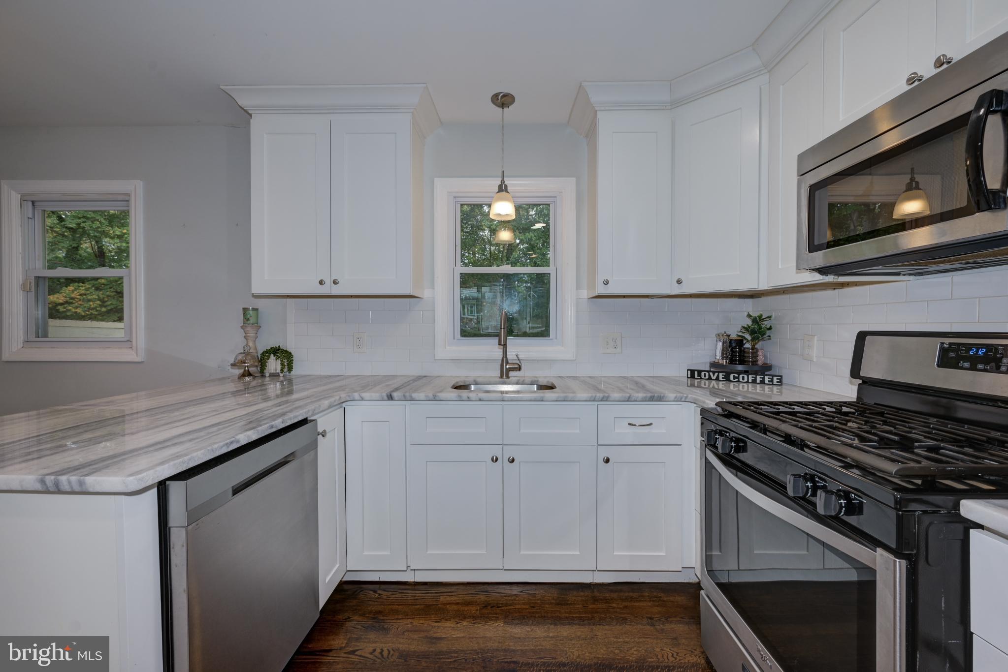 123 Clover Street Mount Holly, NJ 08060 - Photo 9 of 38 Modern kitchen with sleek finishes.