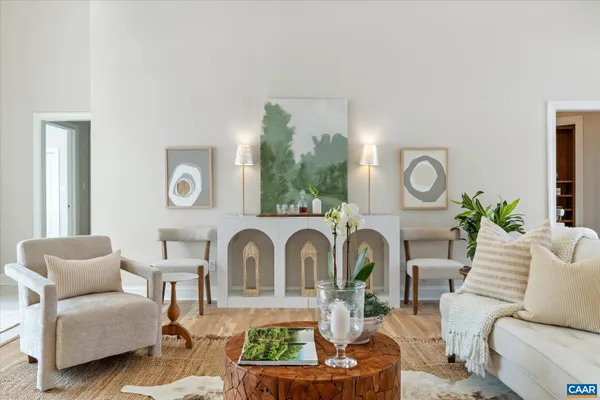 a living room with furniture and a window