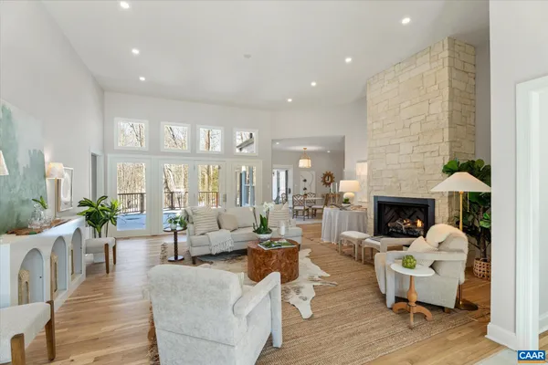 a kitchen with stainless steel appliances a stove top oven a sink a counter space and cabinets