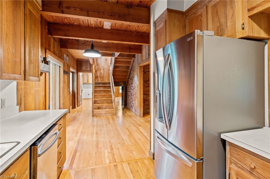 1715 Harper Road Asheboro, NC 27205 - Photo 19 of 48 Kitchen into breakfast and laundry