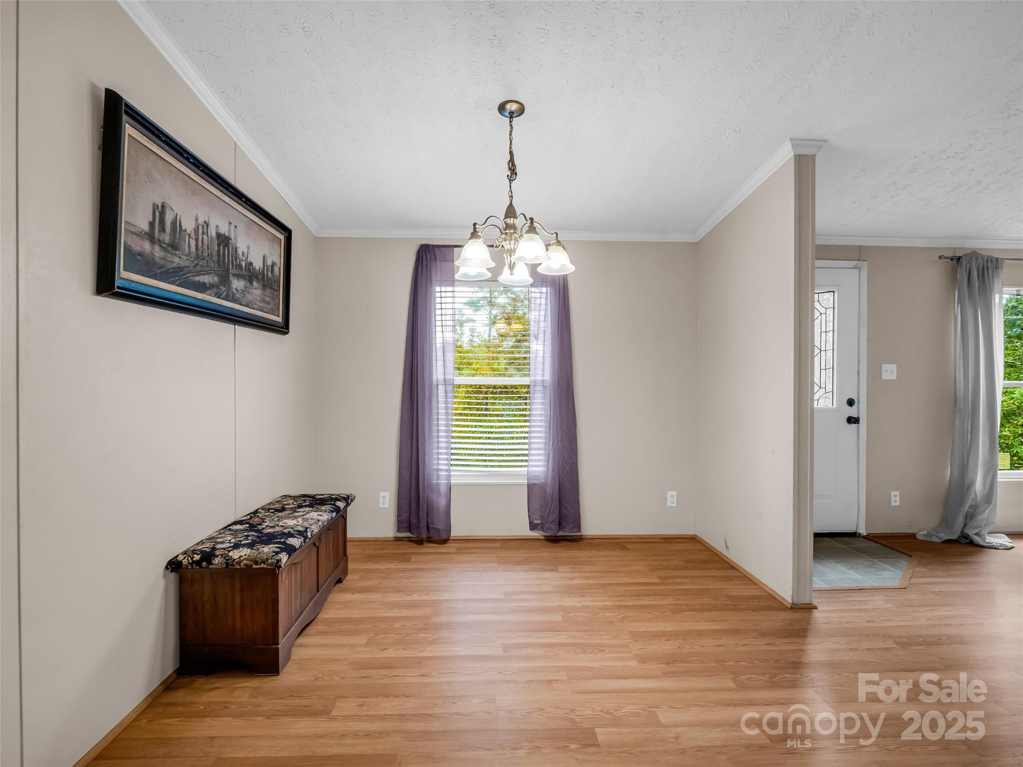 114 Leonards Lane Weaverville, NC 28787 - Photo 12 of 34 a view of a room with wooden floor window and a kitchen space
