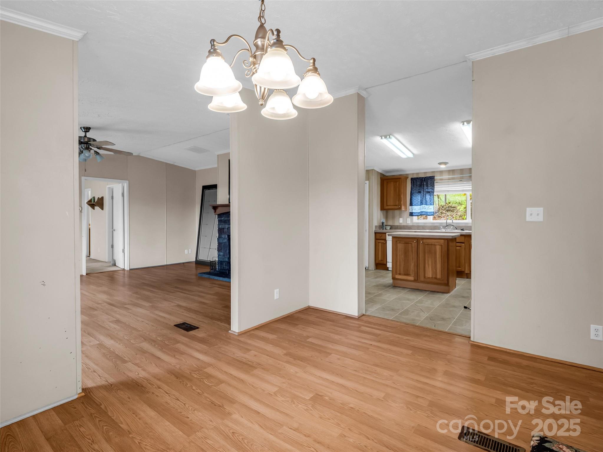 114 Leonards Lane Weaverville, NC 28787 - Photo 13 of 34 a view interior of a house with wooden floor and a kitchen