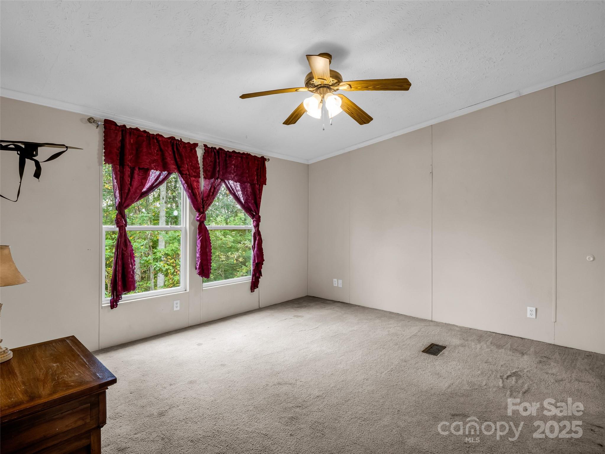 114 Leonards Lane Weaverville, NC 28787 - Photo 14 of 34 a view of room with window and ceiling fan