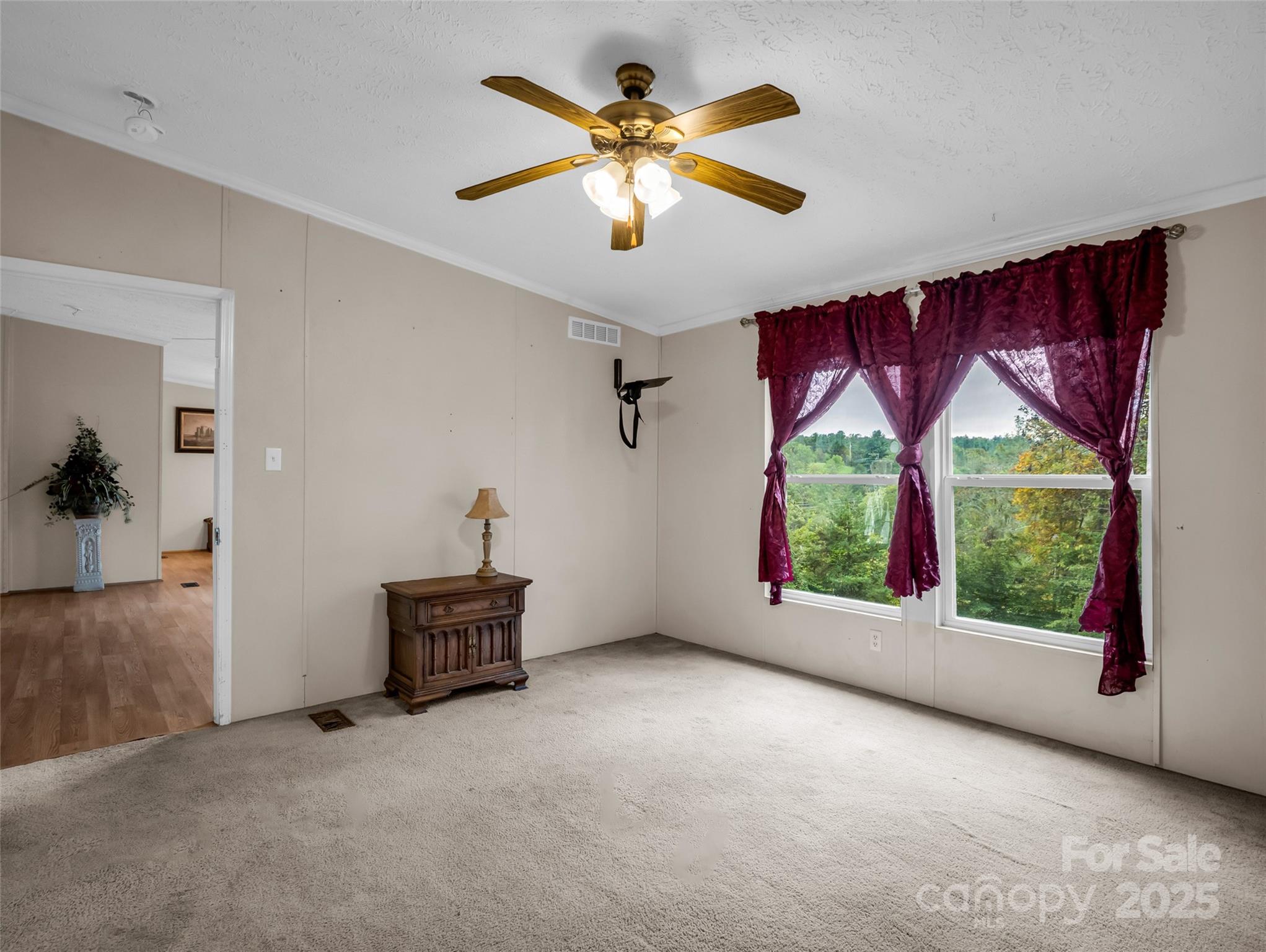 114 Leonards Lane Weaverville, NC 28787 - Photo 15 of 34 wooden floor in an empty room with a window