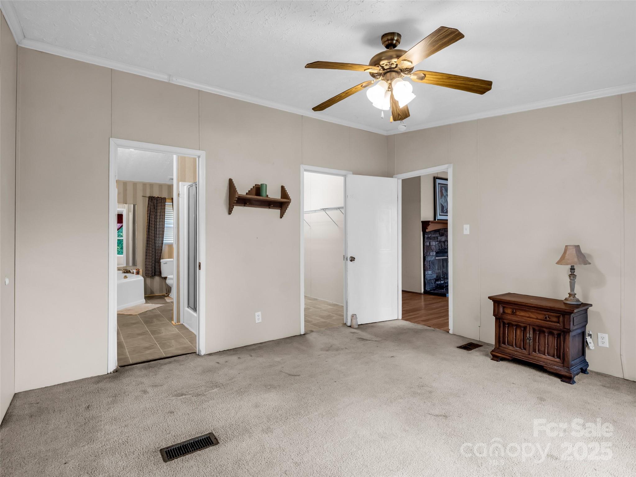 114 Leonards Lane Weaverville, NC 28787 - Photo 16 of 34 a living room with furniture and a chandelier