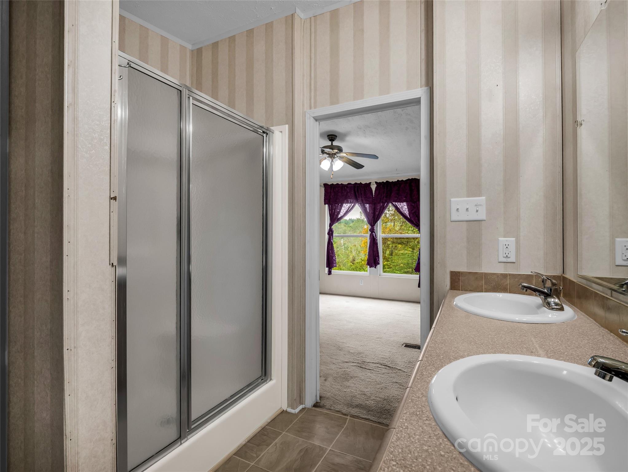 114 Leonards Lane Weaverville, NC 28787 - Photo 18 of 34 a bathroom with a sink and a mirror