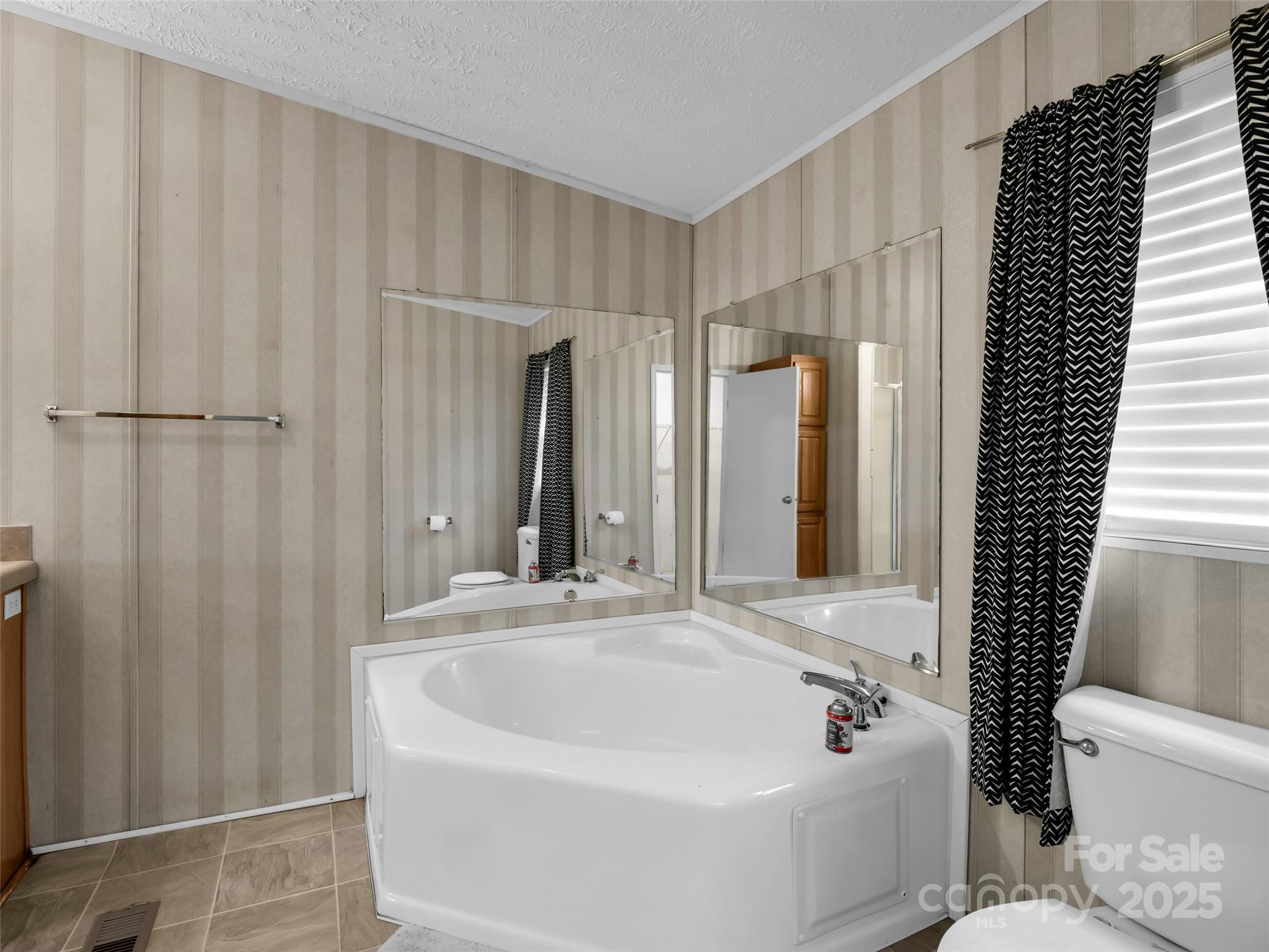 114 Leonards Lane Weaverville, NC 28787 - Photo 19 of 34 a bathroom with a sink and a large mirror