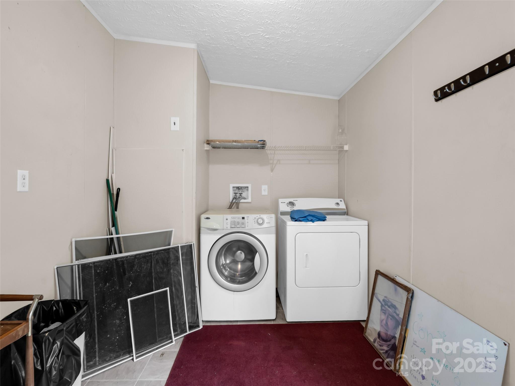 114 Leonards Lane Weaverville, NC 28787 - Photo 27 of 34 a utility room with dryer and washer