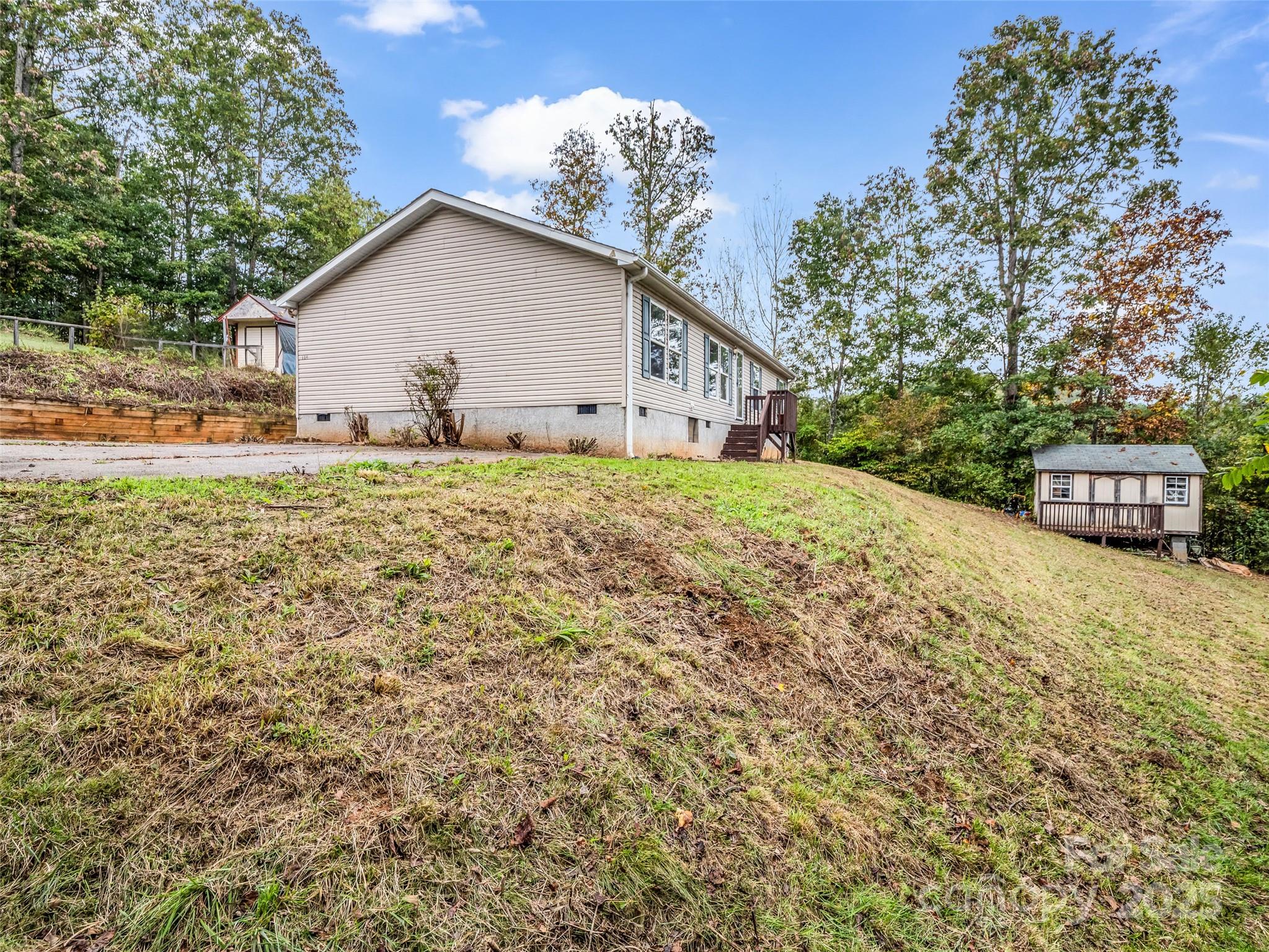 114 Leonards Lane Weaverville, NC 28787 - Photo 4 of 34 a view of a house with a yard